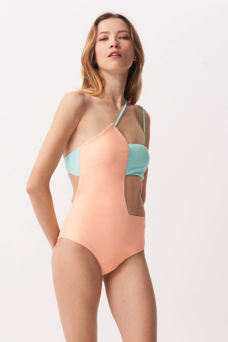 La Libellule. Maillot de bain une pièce. Maillot de bain femme Valentine de couleur saumon et turquoise. Maillot de bain taille haute. Décolleté en bandeau. Double usage, maillot de bain et body.   Maillot de bain femme 1 pièce éco responsable.  Maillot de bain bijou, notre médaillon, signature de notre marque.